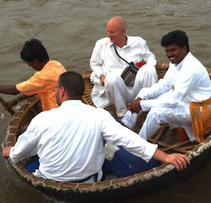 Sri Kaleshwar crossing the river in Hampi